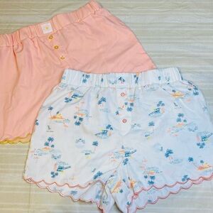 2 Pairs of Rae Dunn Peach with yellow ruffle and White beachy with pink PJ’s